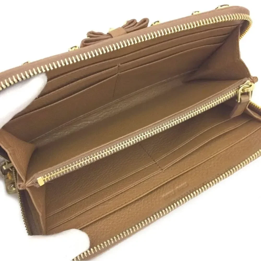 Authentic MIU MIU Ribbon Leather Zip Long Wallet/S2257. 194
